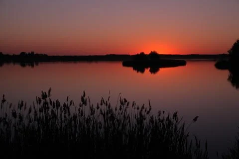 Sunset on the lake Stock Photos