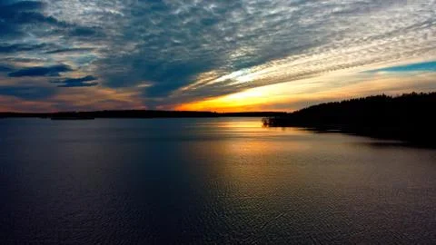 Sunset on a lake Stock Photos