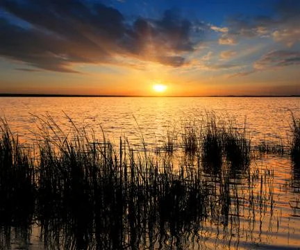Sunset on lake Stock Photos