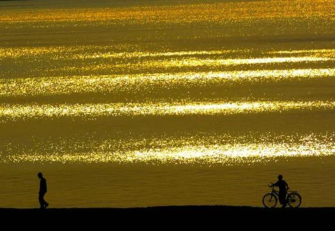 The sunset on a lake Stock Photos