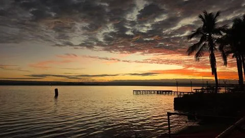 Sunset by the lake. Stock Photos