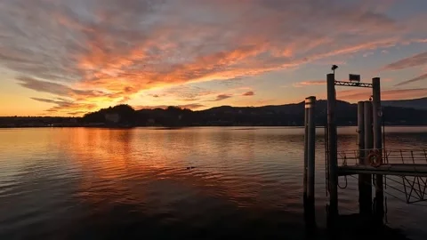 Sunset at the lake with red clouds Stock Footage 232372216
