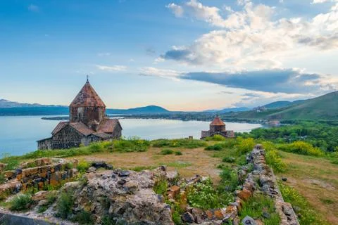 Sunset on Lake Sevan, view of the Sevanavank Monastery, Armenias famous herit 스톡 사진