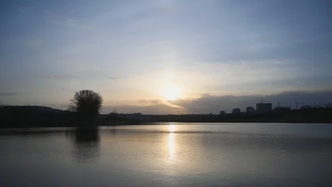 Sunset on the lake shot in a timelapse Stock Footage 127386442