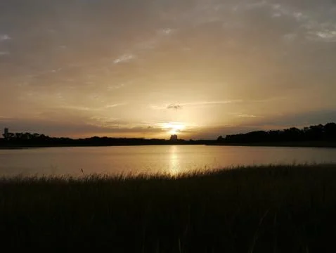 Sunset lake sky Stock Photos