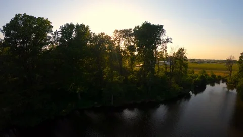 Sunset at the lake on a spring day Stockbeeldmateriaal 89454866