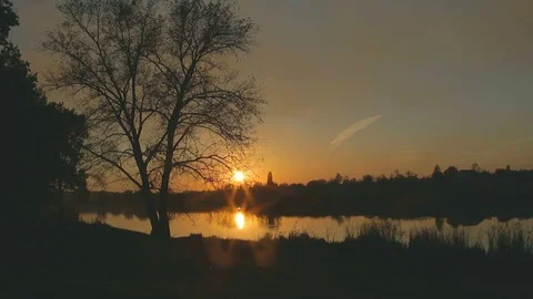 Sunset on a lake time lapse Stock Footage 71657126