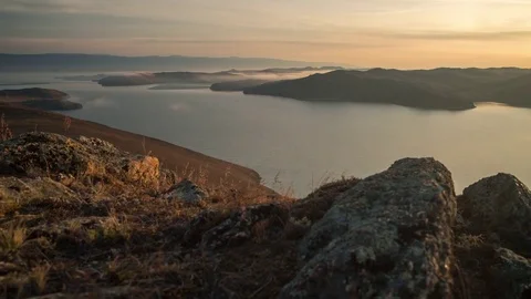 Sunset on the lake, time-lapse Stock Footage 76899580