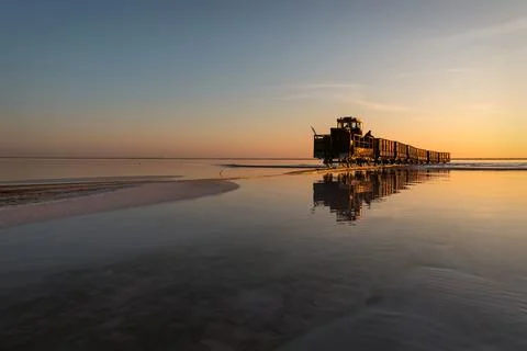 Sunset lake train rails reflection salty Stock Photos