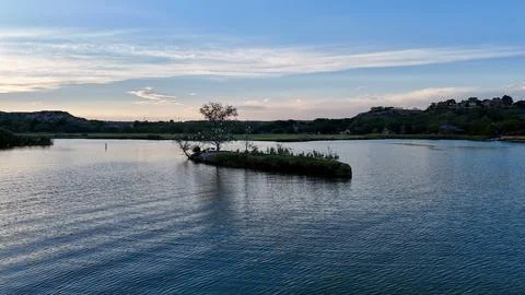 Sunset Lake with a tree Stock Photos
