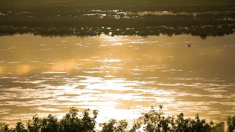 Sunset on the lake in the village Stock Footage 76466710