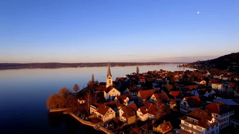 Sunset lakeside village Stock Footage 128946952