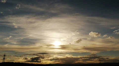 Sunset on the land with power lines in the background. 4k downscaling to 1080p Video stock 37999617