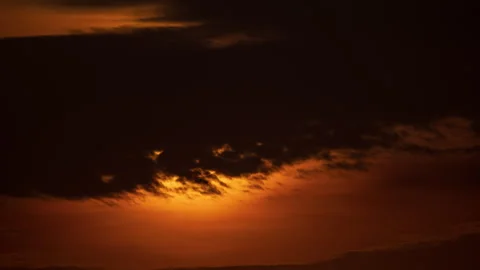Sunset landscape behind clouds, magnificent sunset, nature, landscape with Video stock 260392317