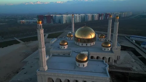 Sunset landscape of a mosque under construction, aerial view from above. Stock Footage 304445340