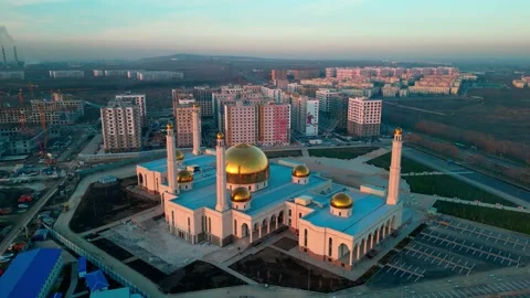 Sunset landscape of a mosque under construction, aerial view from above Stock Footage 304518778