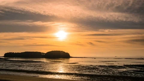 Sunset landscape of Muchangpo Beach. Time lapse. Zoom in Video stock 145741193