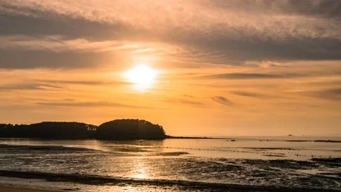 Sunset landscape of Muchangpo Beach. Time lapse. Zoom out Stock Footage 145741267