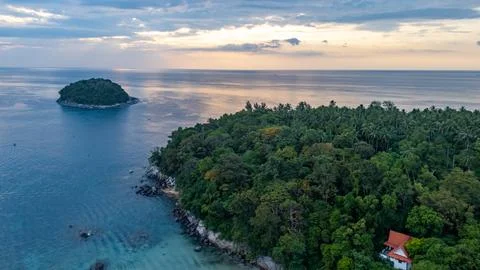 Sunset landscape over Ko Man island Phuket southern Thailand aerial Stock Photos