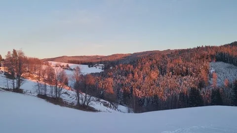 Sunset landscape with snow covered mountains  Stock Footage 261297013