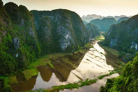 Sunset landscape view of Ninh Binh valley with Tam Coc river in the mountai.. Stock Photos