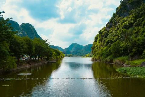 Sunset landscape view of Ninh Binh valley with Tam Coc river in the mountai.. Stock Photos