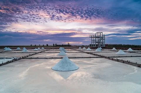 Sunset Light and Moving Clouds Over Salt Fields in Qigu, Tainan City, Taiwan. Stock Photos