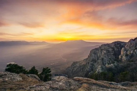Sunset light in the Demerdzhi mountain range in the Valley of ghosts Stock Photos