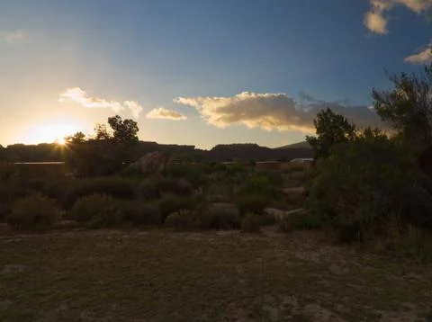 Sunset with light effect in arid plain in South Africa Stock Photos