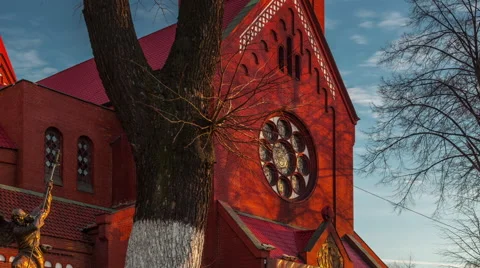 Sunset light famous minsk red catholic church 4k time lapse belarus Stock Footage 64566641