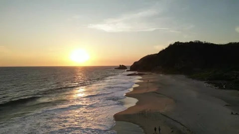 Sunset Light Illuminating Gentle Ocean Waves on Empty Sand Mazunte Mexico Vídeos de archivo 321707617