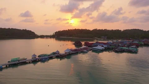 Sunset light over Bang Bao Pier with stilt homes and boats, Thailand Stock Footage 310053814