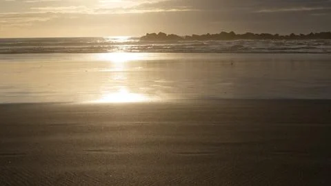 Sunset light over the ocean Stock Photos