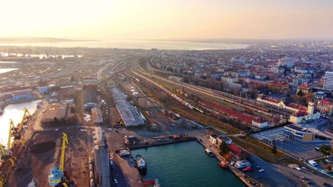 Sunset light over a port railway station and city, Burgas, Bulgaria Stock Footage 337195986