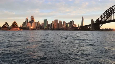 Sunset light over Sydney city CBD landmarks across Harbour in 4k timelapse. Stock Footage 135502756