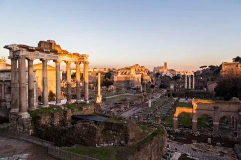 Sunset light on the Roman Forums, the Colosseum in the background,Rome, Roma, Stockfoto's