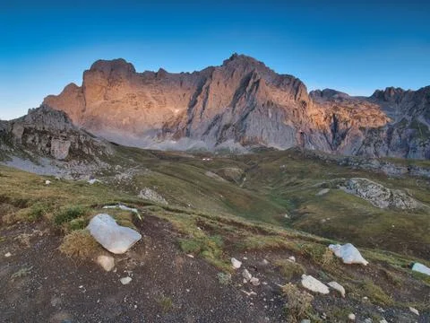 Sunset light on rugged Picos de Europa - Wide-angle view of a massive rocky.. Stock Photos