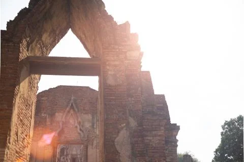 Sunset light shots and ancient temple door architecture in Thailand Stock Photos