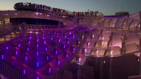 Sunset light show at Setas de Sevilla Metropol Parasol in Seville Andalucia Stock Footage 238842985