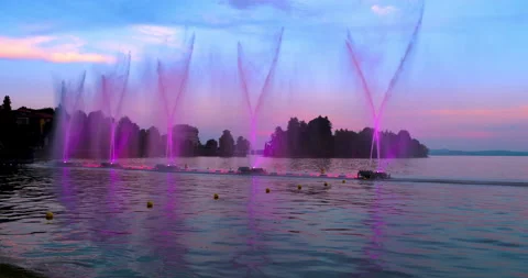 Sunset with light shows on lake Maggiore Stock Footage 340265570