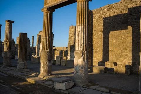 Sunset light on Temple of Apollo columns, Pompeii Stock Photos