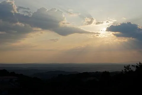 Sunset light view throught clouds Stock Photos