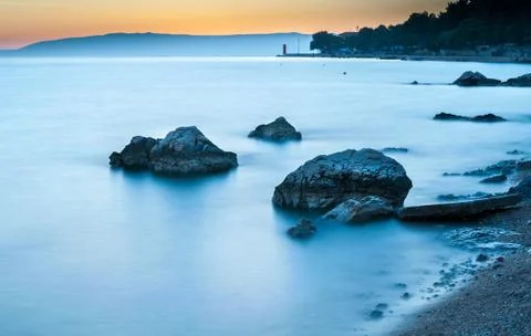 Sunset with lighthouse in Cres Stock Photos