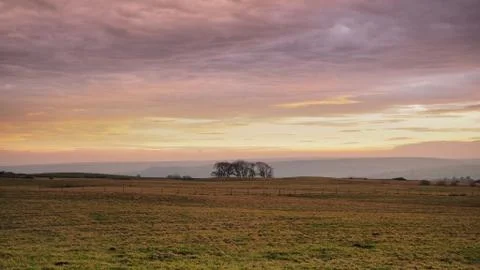 Sunset lighting up the clouds over Danby Moor, North York Moors National Park Stock Photos