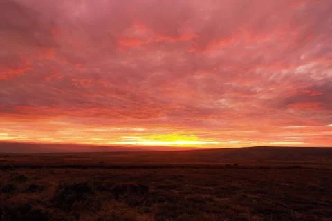 Sunset lighting up the clouds over Danby Moor, North York Moors National Park Stock Photos