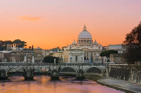 Sunset lights of the basilica St Peter in Rome, Italy Stock Photos