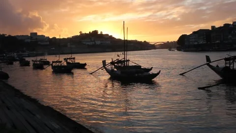 Sunset lights in Douro river in Porto, Portugal Stock Footage 320085646