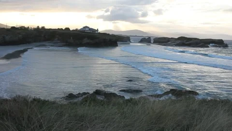 Sunset lights in Os Castros Beach, Ribadeo, Spain Stock Footage 320808188
