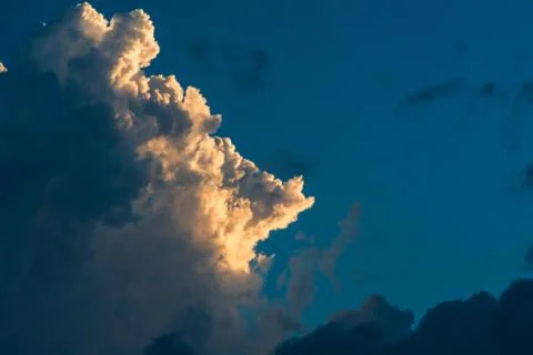 Sunset lit up relief cloud Stock Photos