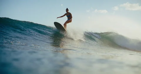 Sunset Longboarding in Hawaii Stock Footage 202095973